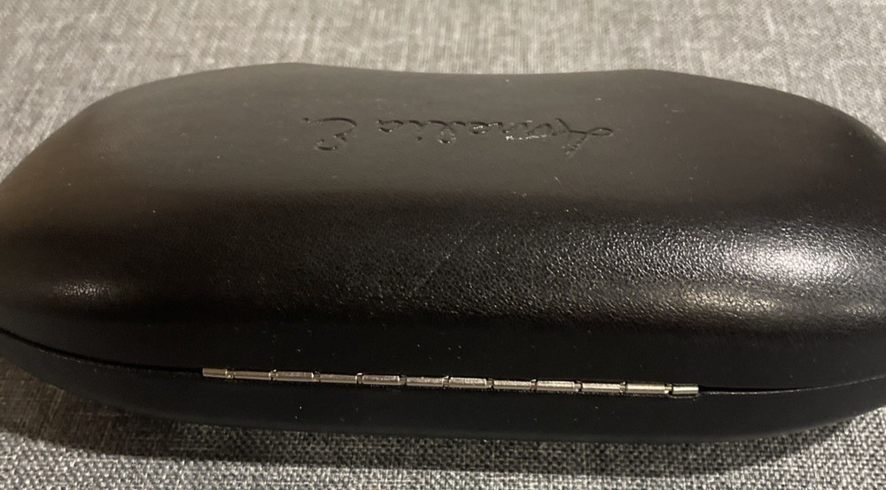 Amelia E. EYEGLASS CASE USED