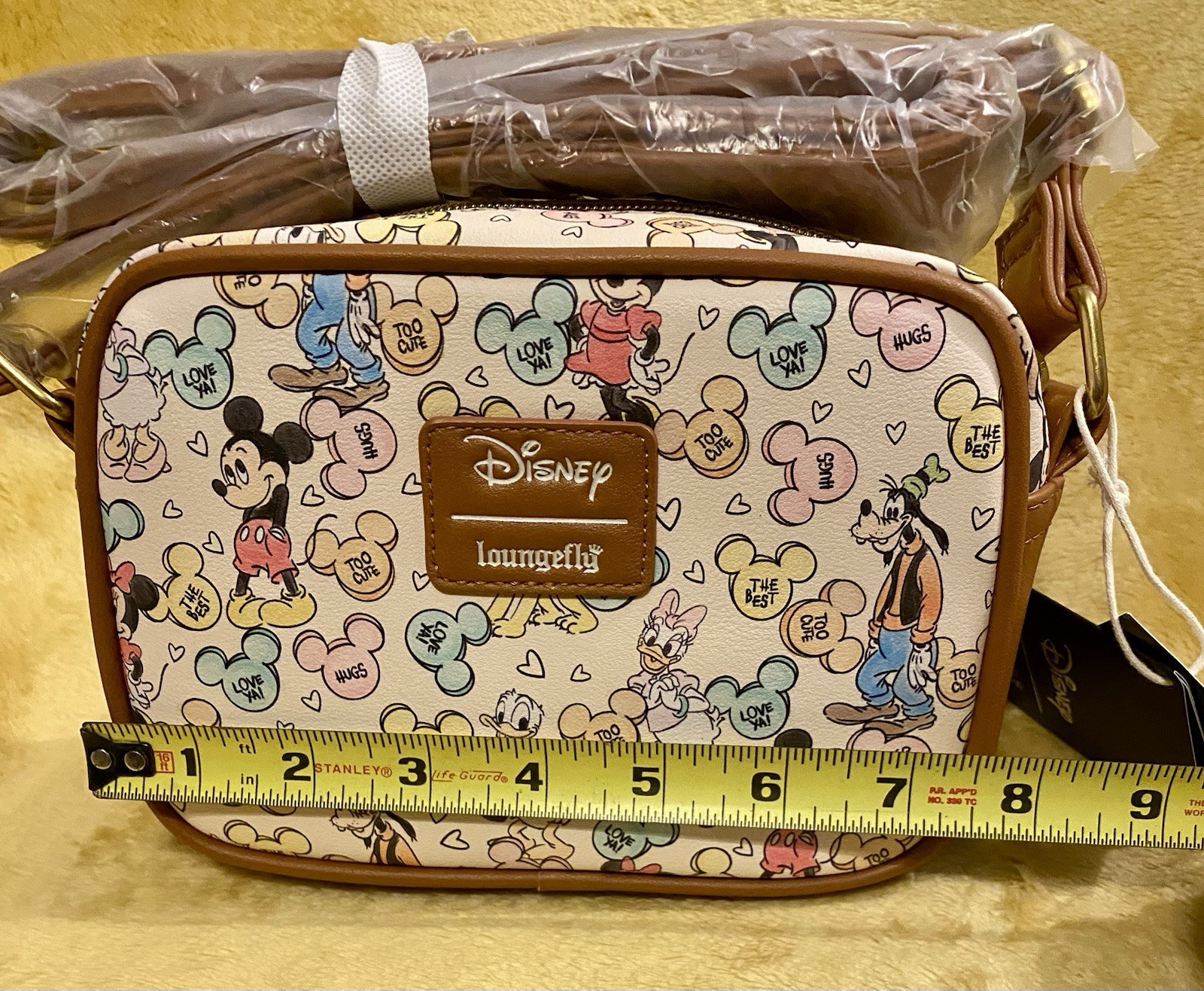 LOUNGEFLY Disney Mickey Mouse & Friends Candy Camera Zip Closure Crossbody Bag.