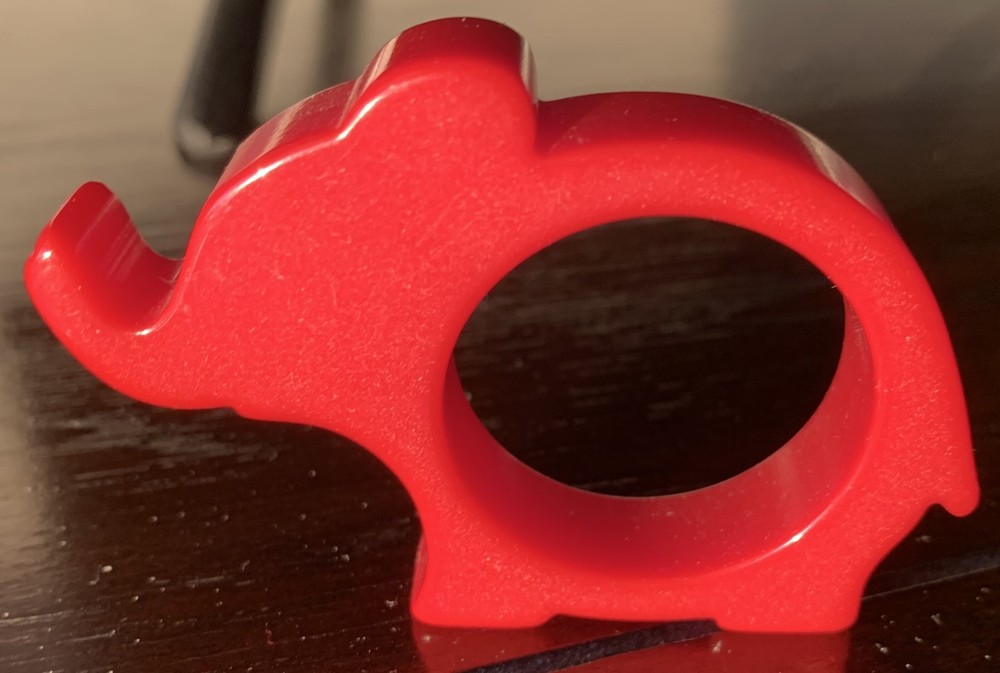 Bakelite Red Elephant Napkin Ring. Approx 3" wide.