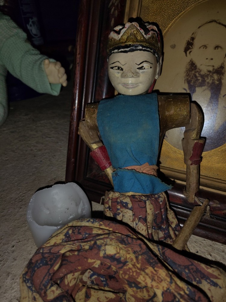 Haunted wooden puppet figure