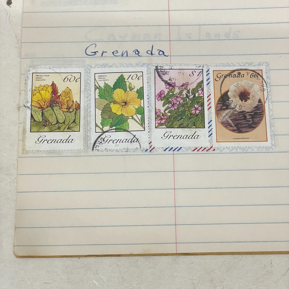 4 Grenada Stamps used on paper