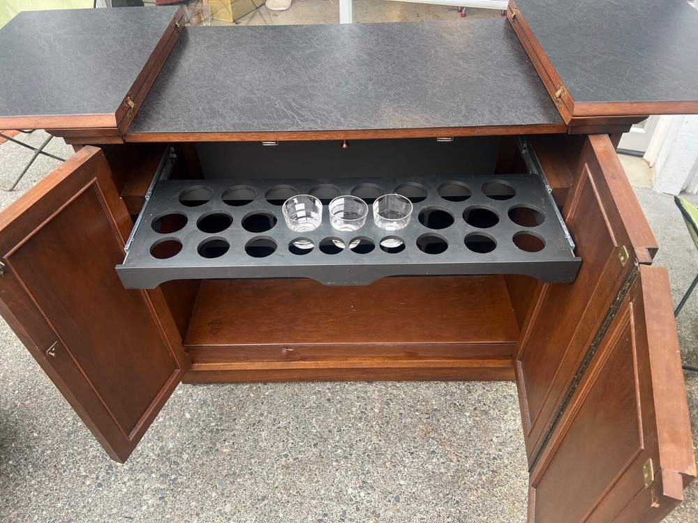 Jasper Cabinets Mid Century rolling walnut bar