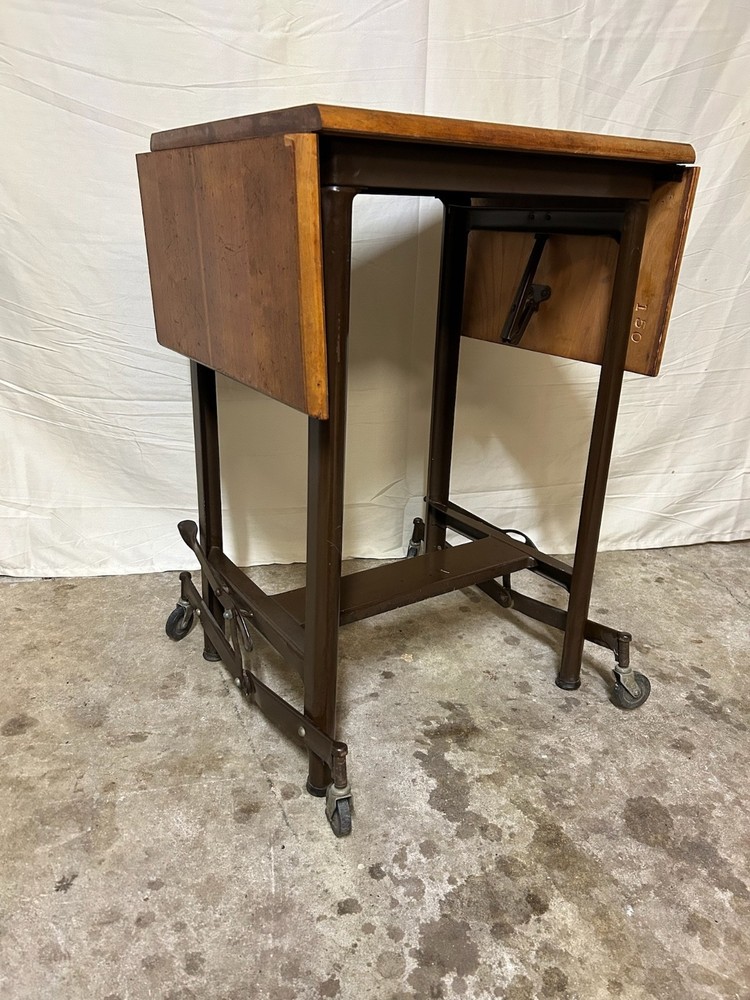 Unique rustic industrial steampunk drop leaf utility table, steel base