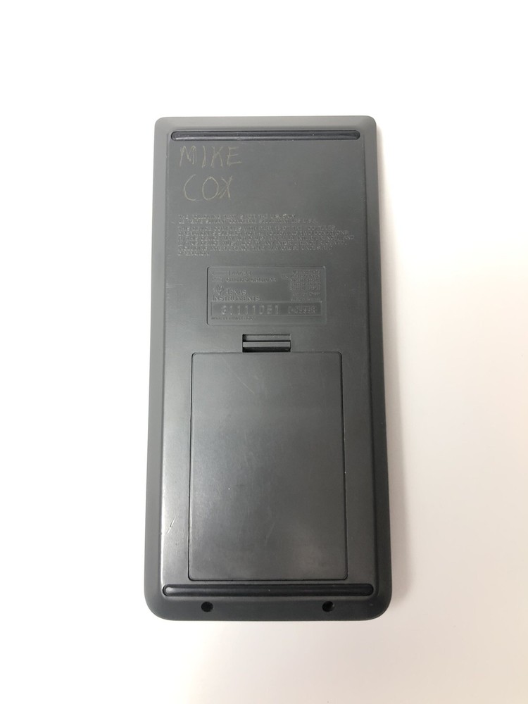 Texas Instruments TI-82 Graphing Calculator w/ Guidebook Manual