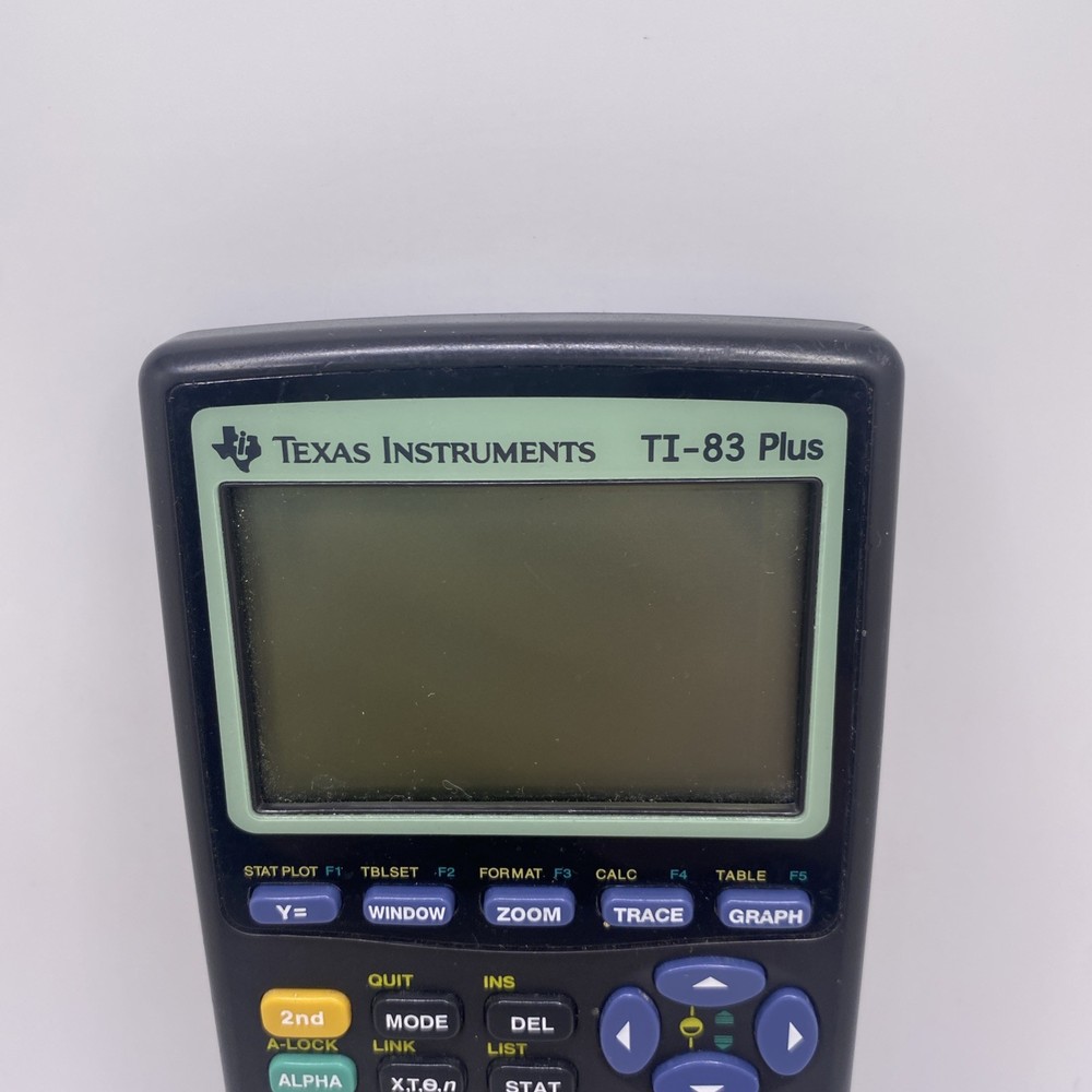 Texas Instruments TI-83 Plus Graphing Calculator For Parts Untested