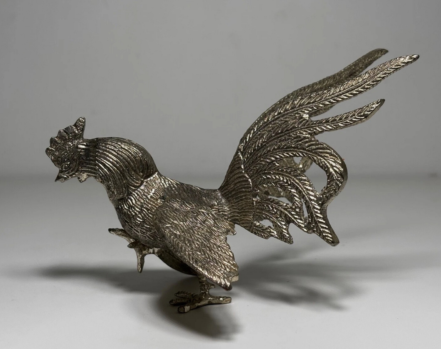 Pair of silver-plated metal fighting roosters, antique bird, rustic decoration