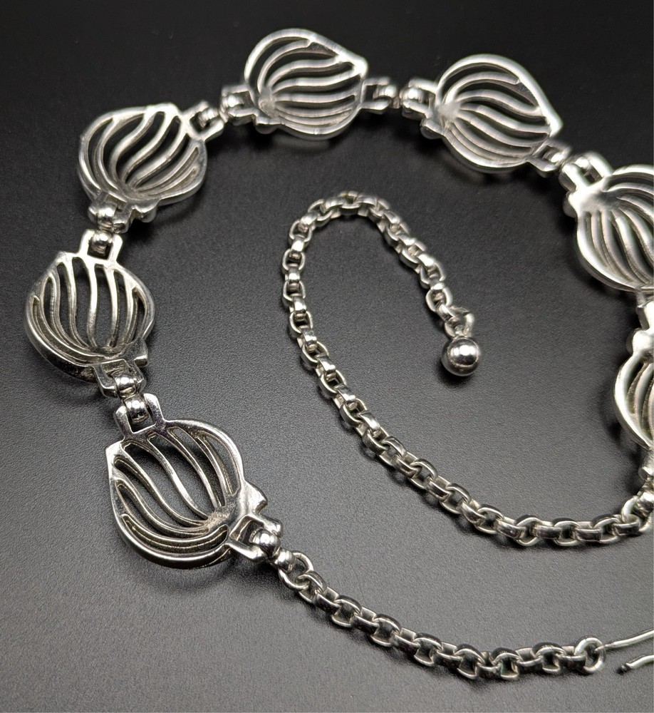 Silver-Toned Bracelet and Necklace Set Featuring Abstract Leaf Patterns
