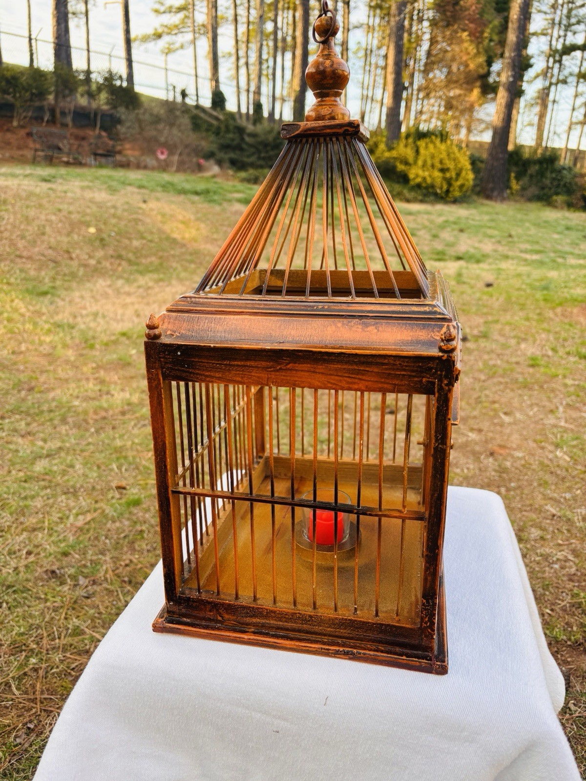Wood Birdhouse with a pagoda-style top and intricate architectural details