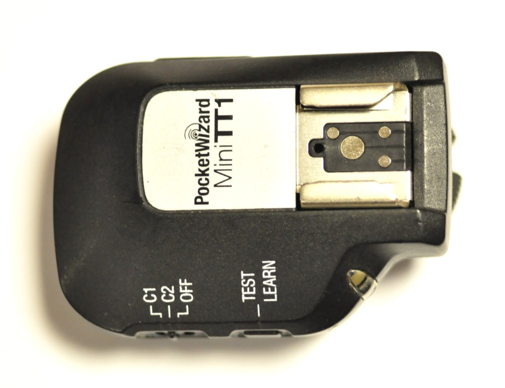 PocketWizard Mini TT1 transmitter for Nikon with instructions.
