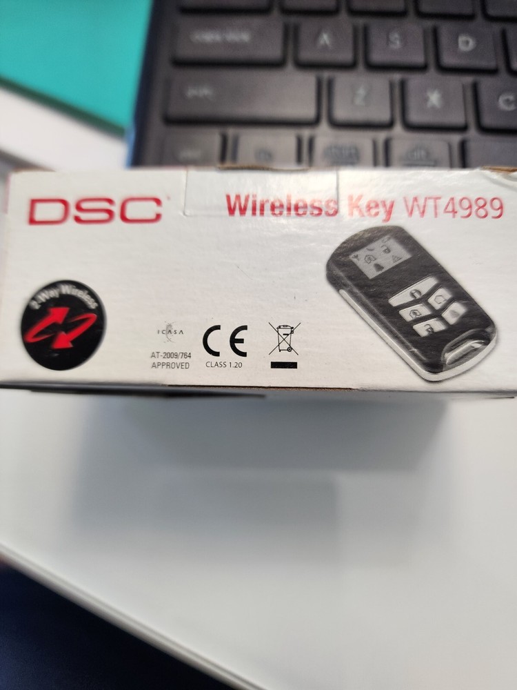 DSC WT4989 4 Button Wireless Backlit Security Key Fob With Icon Display