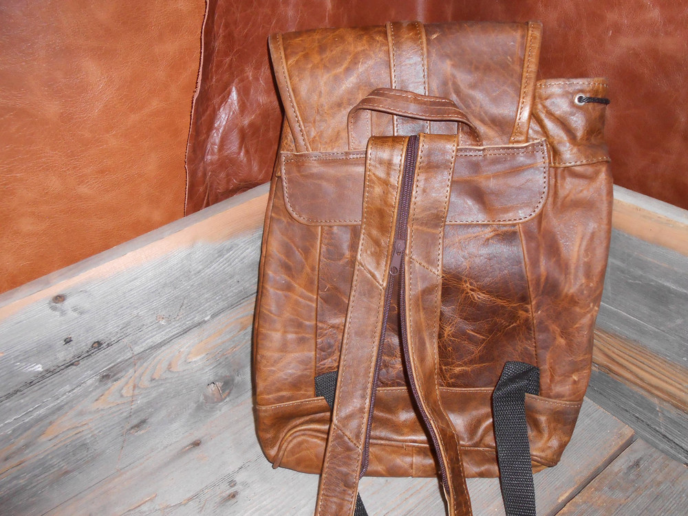 New medium to large sized backpack spacious with zipper pockets