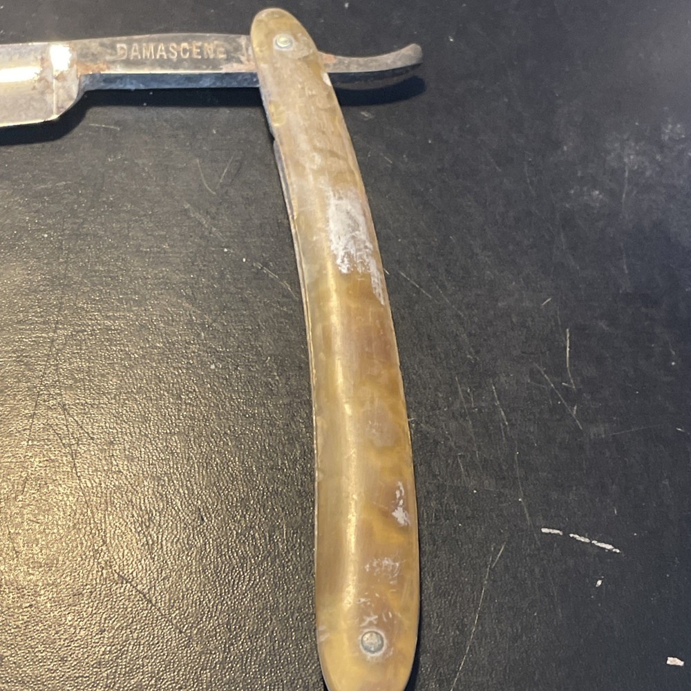 Two vintage straight razors