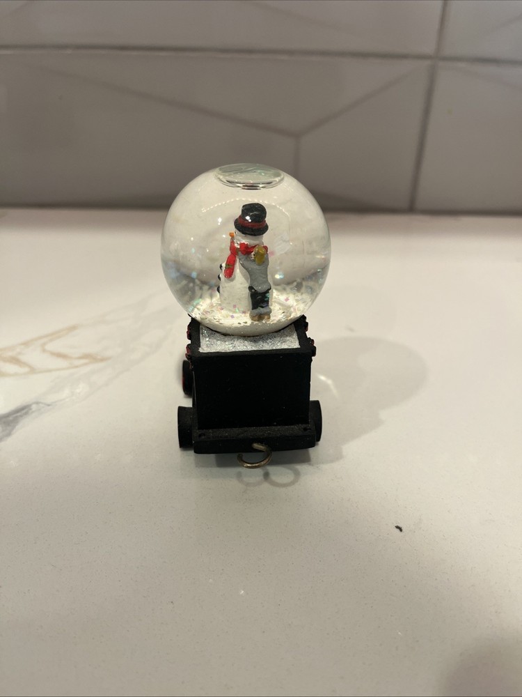 F.A.O SCHWARZ 4- piece Train Snow Globe Set