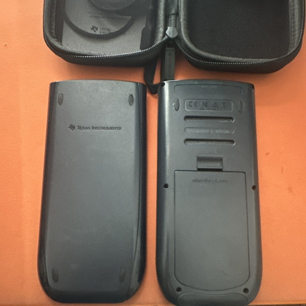 Texas Instruments TI-84 Plus Graphing Calculator with Case & Charging Cable