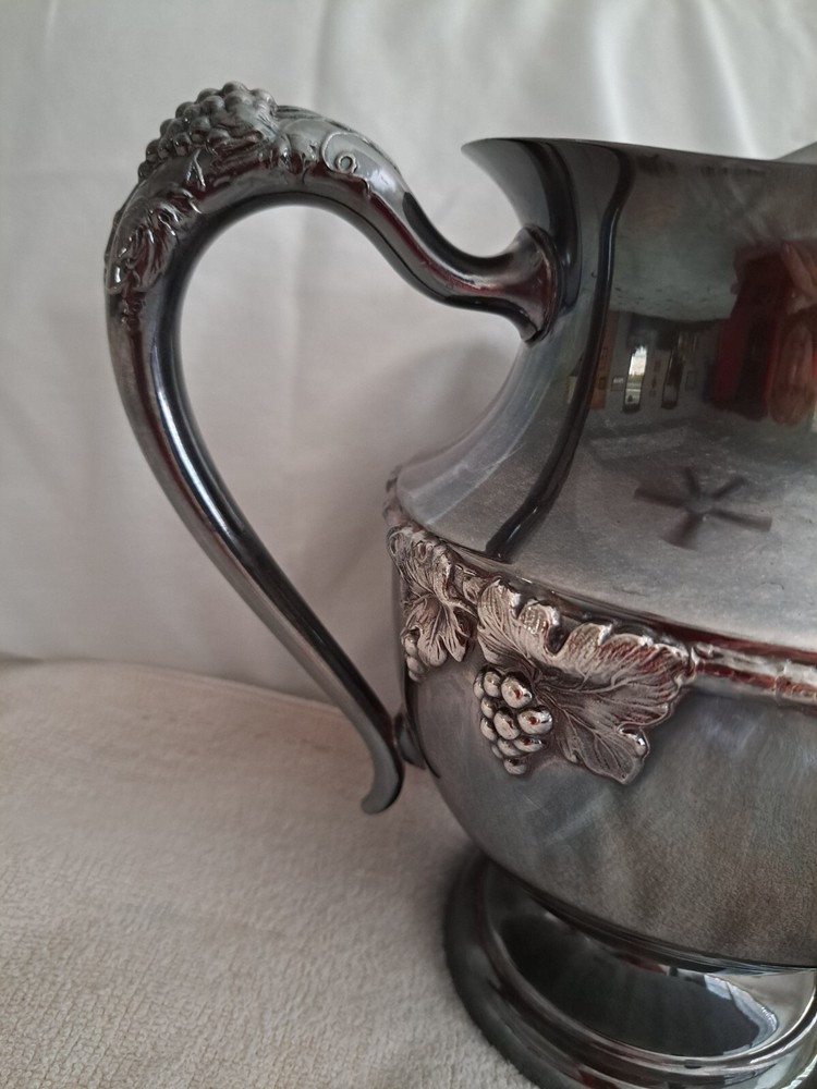 silver embossed grapes and leaf water pitcher