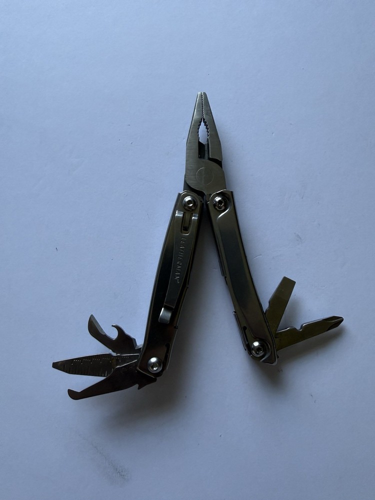 Leatherman multi-tool: Rev Good Condition - FREE SHIPPING