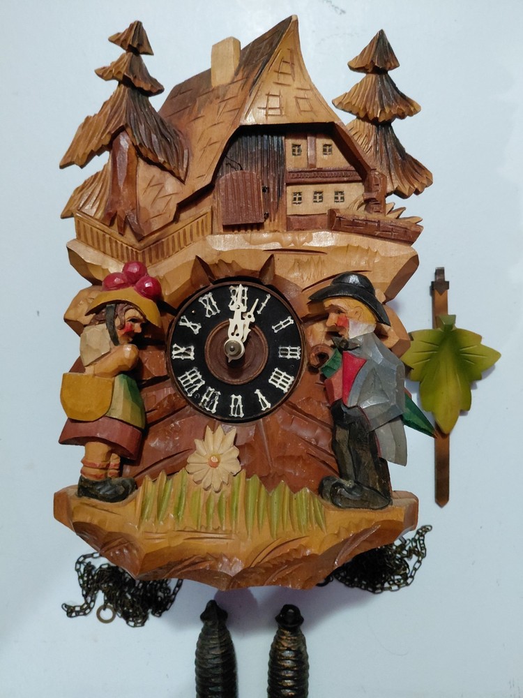 Vintage deeply hand carved Cuckoo clock