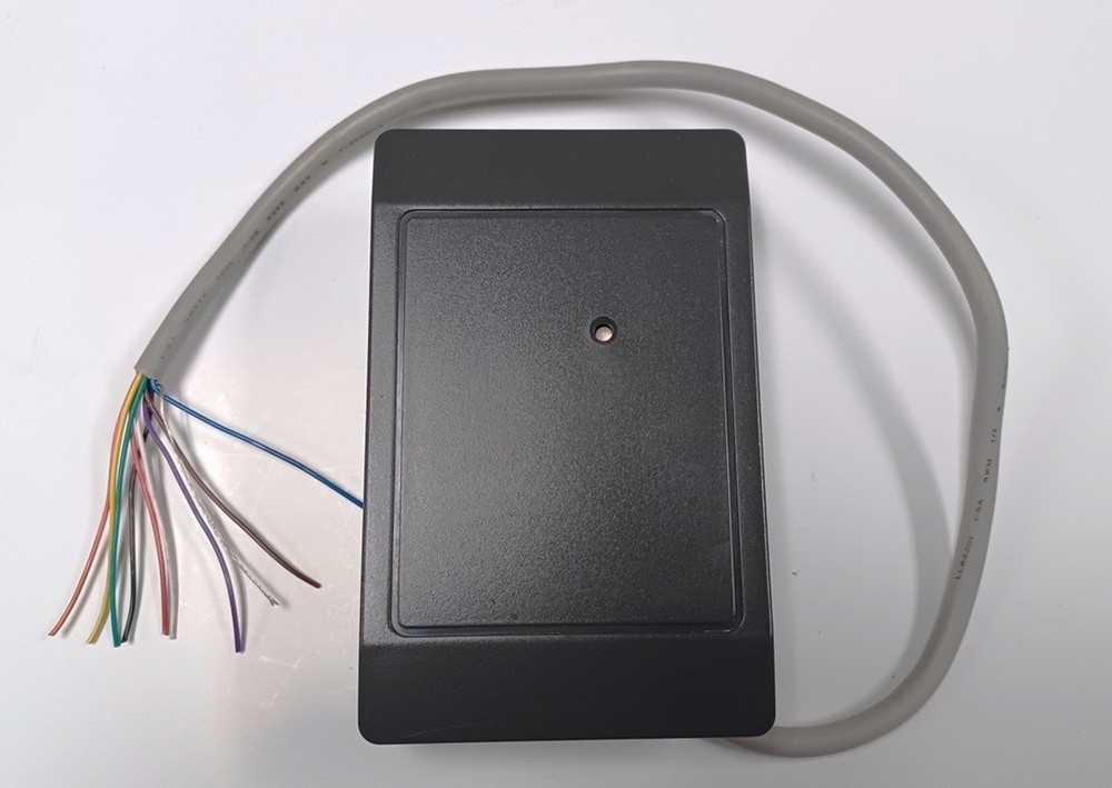 HID 5395CK100 ThinLine II Wall Switch Reader, Black or Gray, Used.