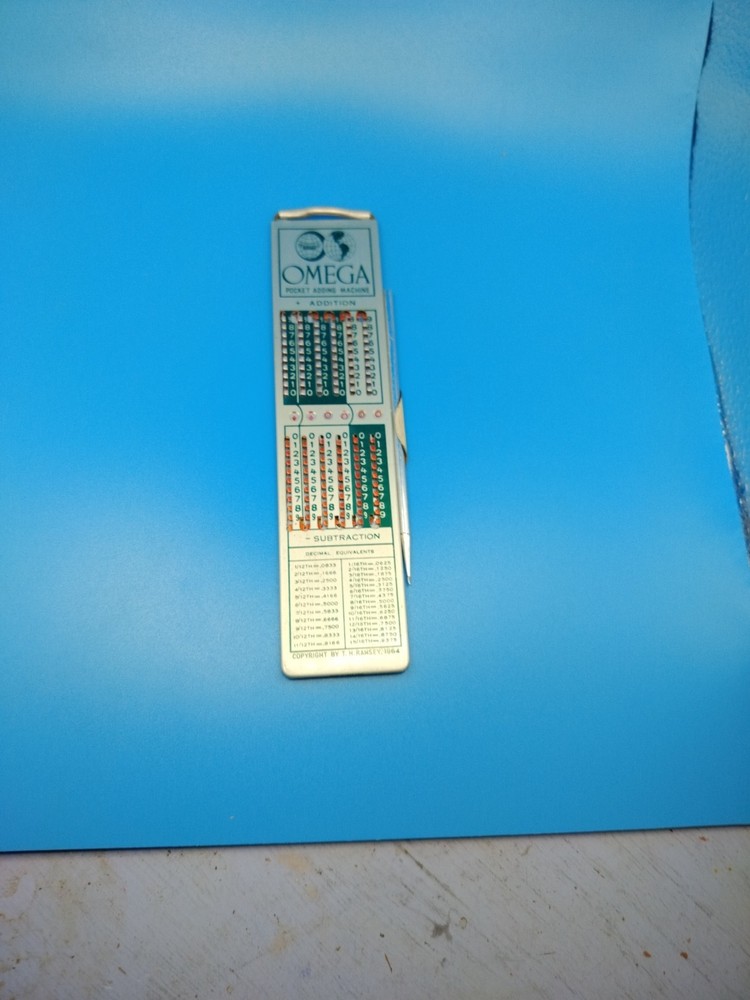 Vintage Omega Pocket Adding Machine , Collectible