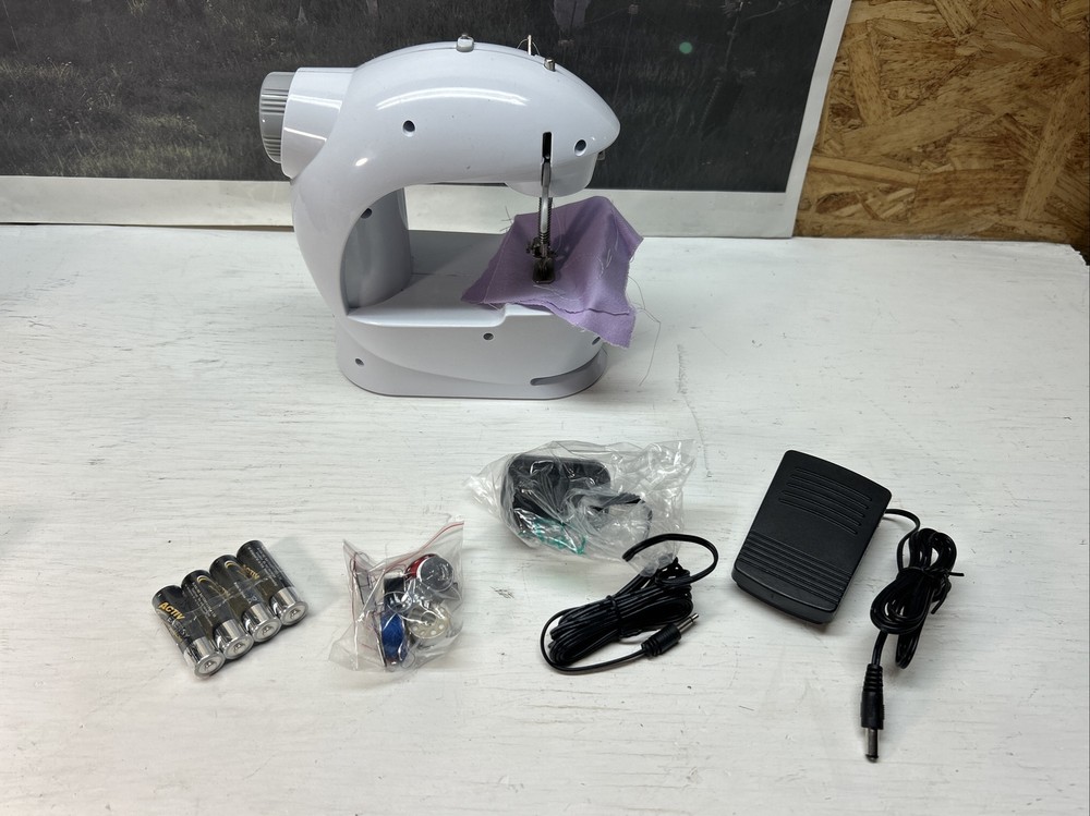 (Z). EASY HOME SOLUTIONS MINI SEWING MACHINE