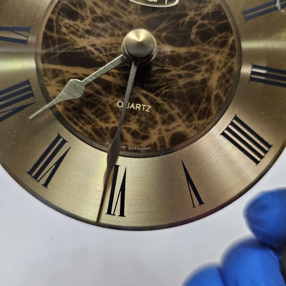 Hechinger Quartz (W. Germany) mantel clock 6" brass, floating effect. Working!