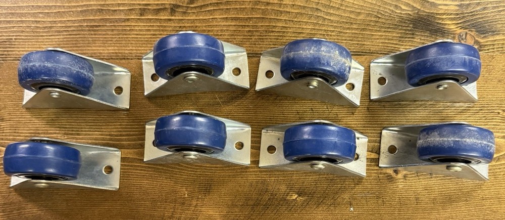 8- 2 7/8 Fixed Blue Casters Pre-owned