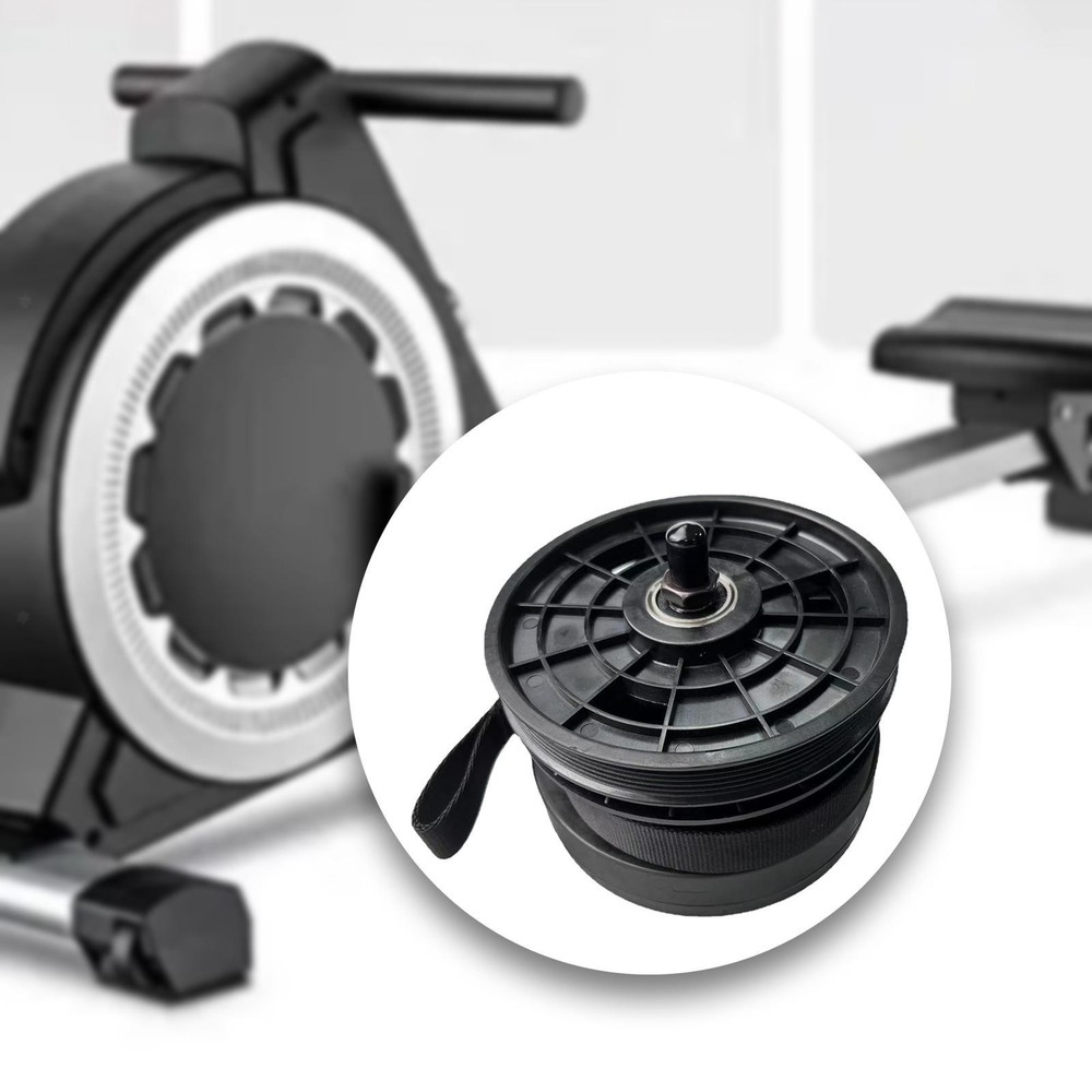 Rowing Machine Resistance System with Webbing and Gravity Wheel