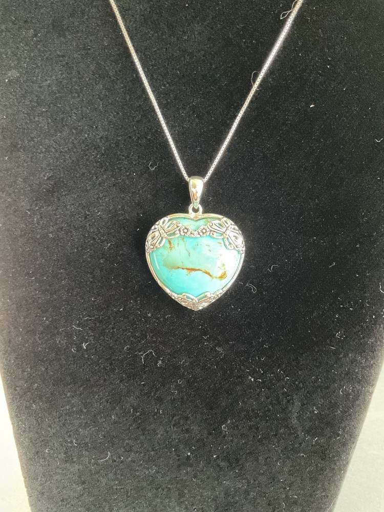 STER.LING SILVER AND TURQUOISE PENDANT