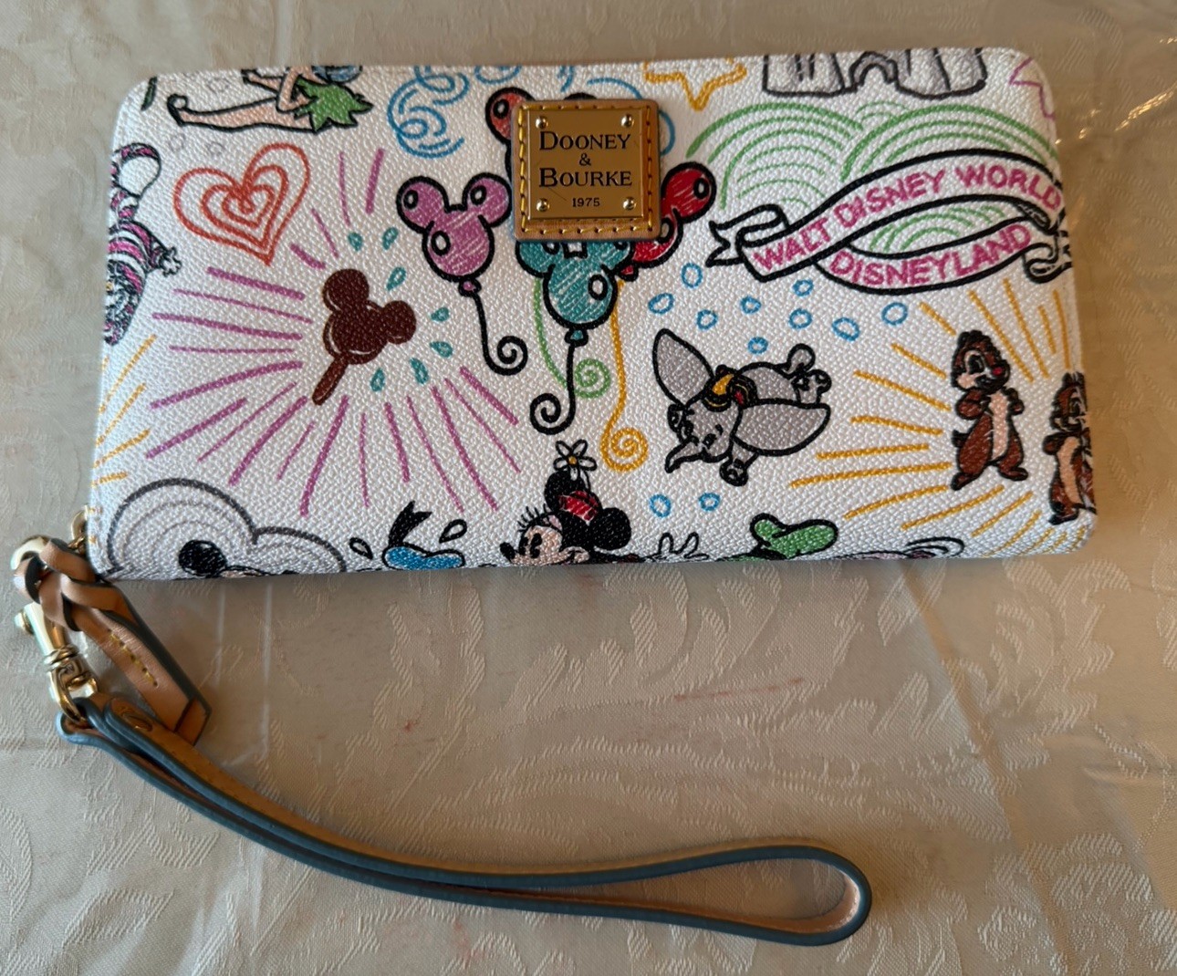DOONEY & BOURKE Disney Wristlet/ Wallet Model number FAC 070638 Sketchbook