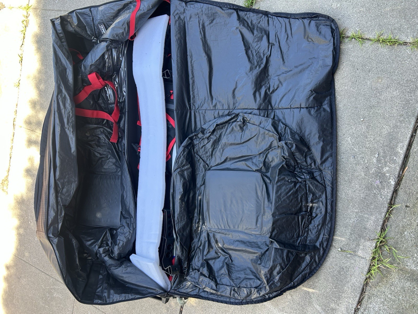 EVOC Bike Transport Bag Black Nylon with Wheels, Carry Handle, Zip Closure