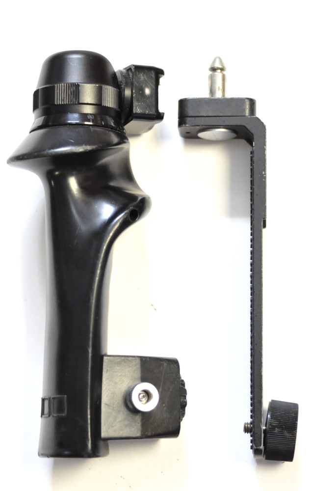 Sunpak deluxe flash / accessory / grip bracket with their cable release.