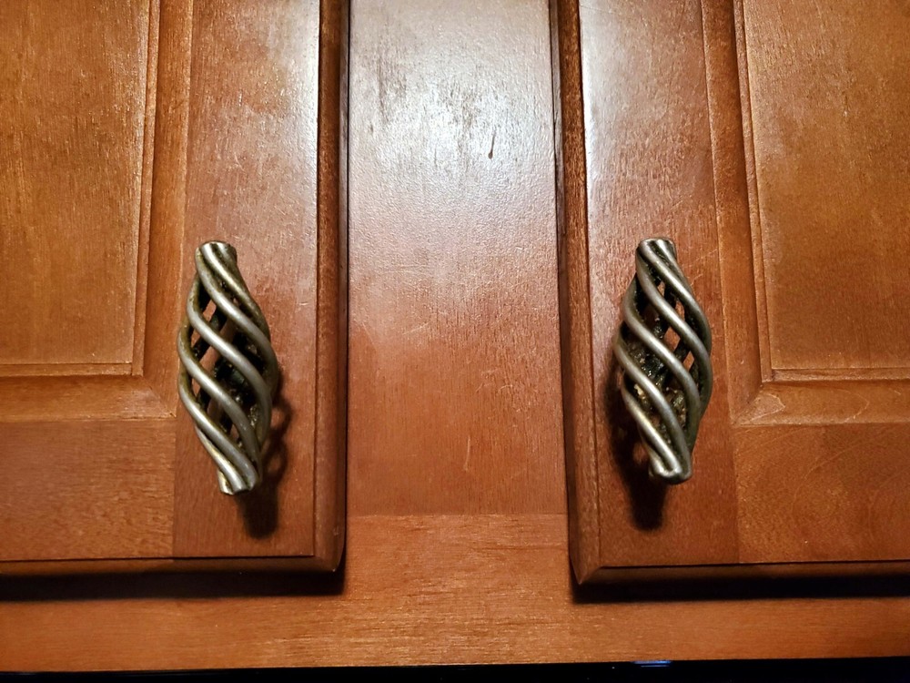 Cabinet Pulls/Knobs. Two styles in Brushed Satin. 35 total. Screws Included.
