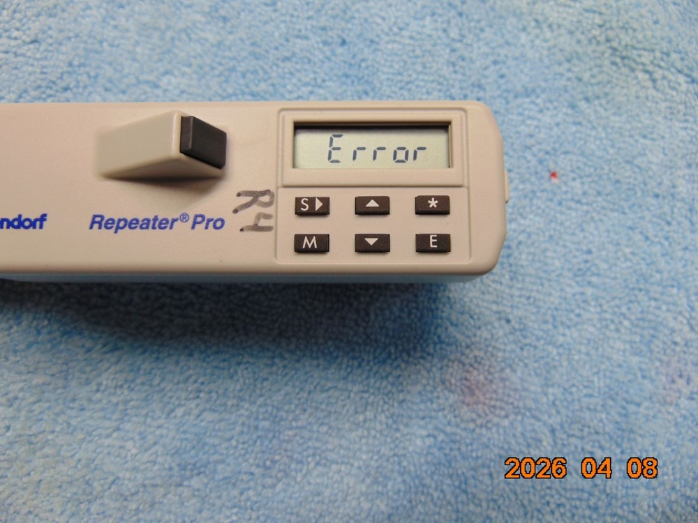 Eppendorf Repeater Pro Pipette and charging stand
