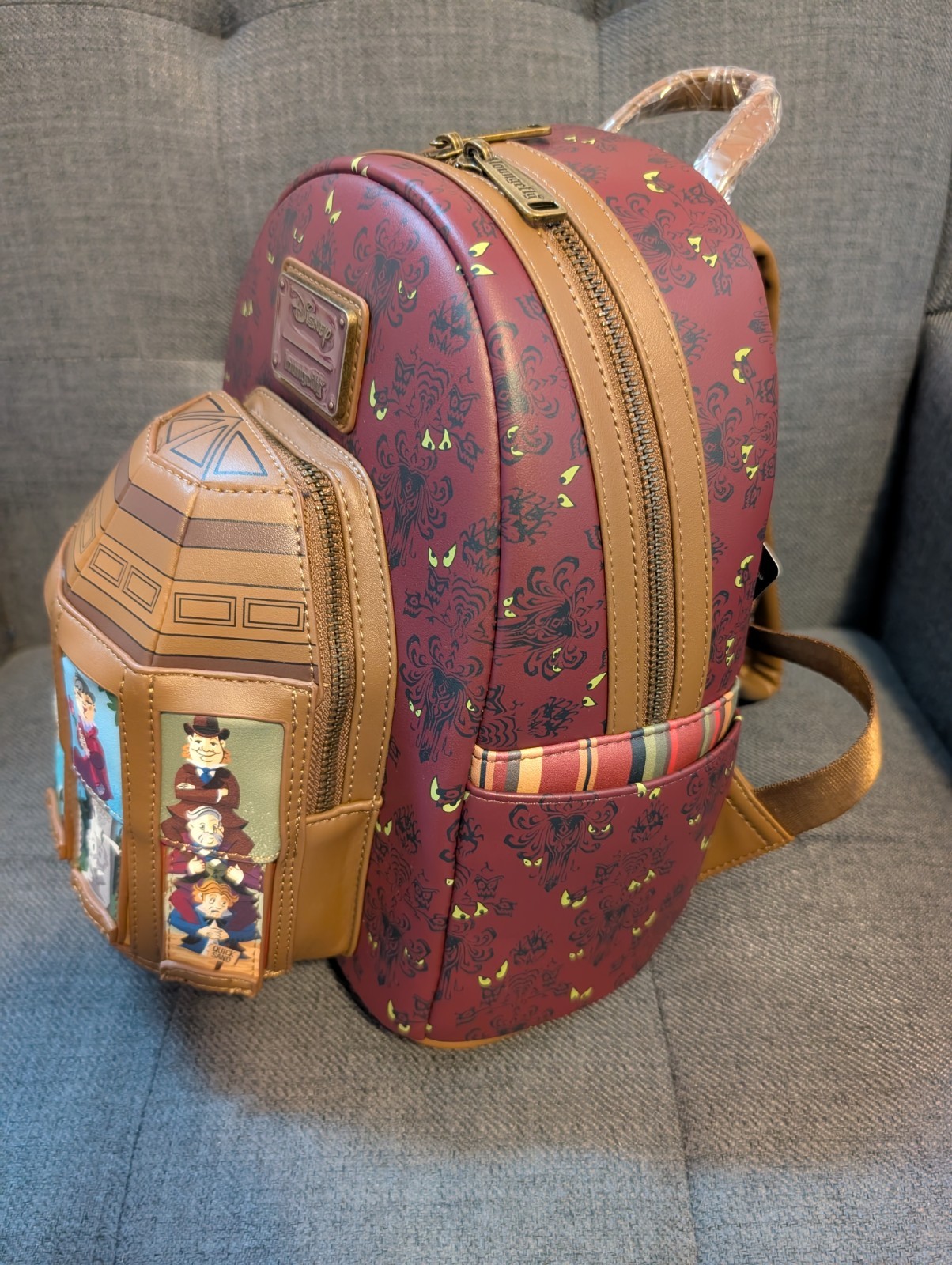 Disney Haunted Mansion Stretching Room Portraits Glow-in-the-Dark Mini Backpack