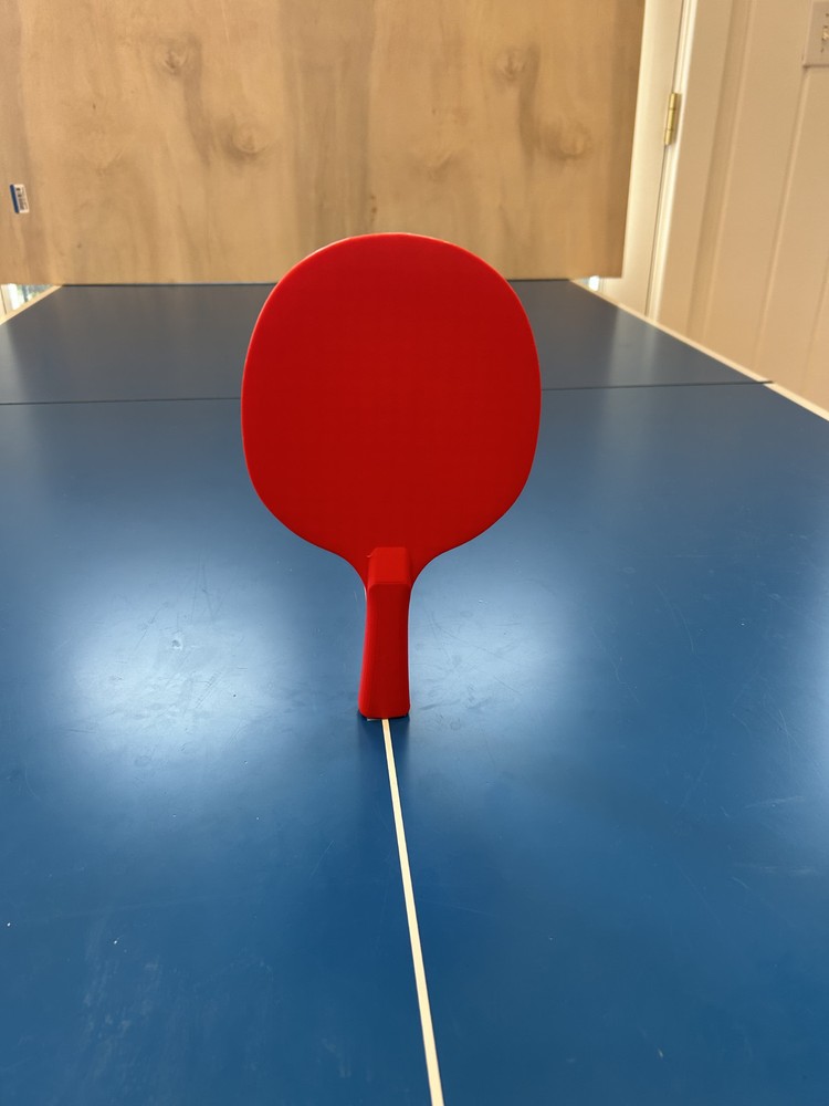 Red 3D printed ping pong paddle