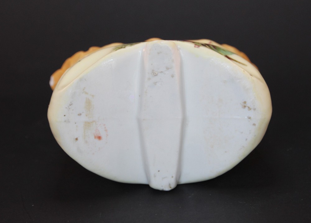 Vintage flared open sugar container with flowers on front. Unique shape