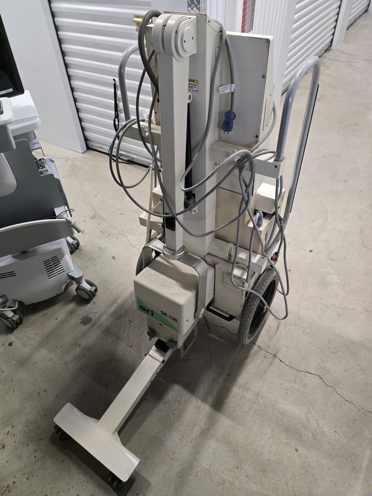 SR-130 source ray machine