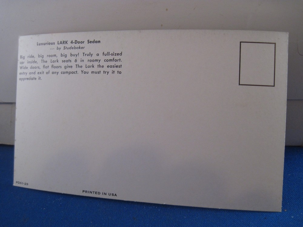 Studebaker 1961 lark 4dr mint postcard ***
