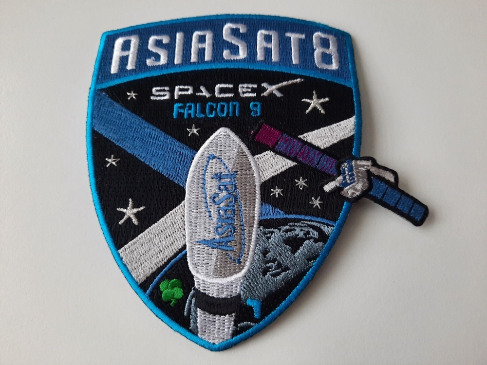 SpaceX Falcon-9 rocket launch with AsiaSat-8 satellite patch