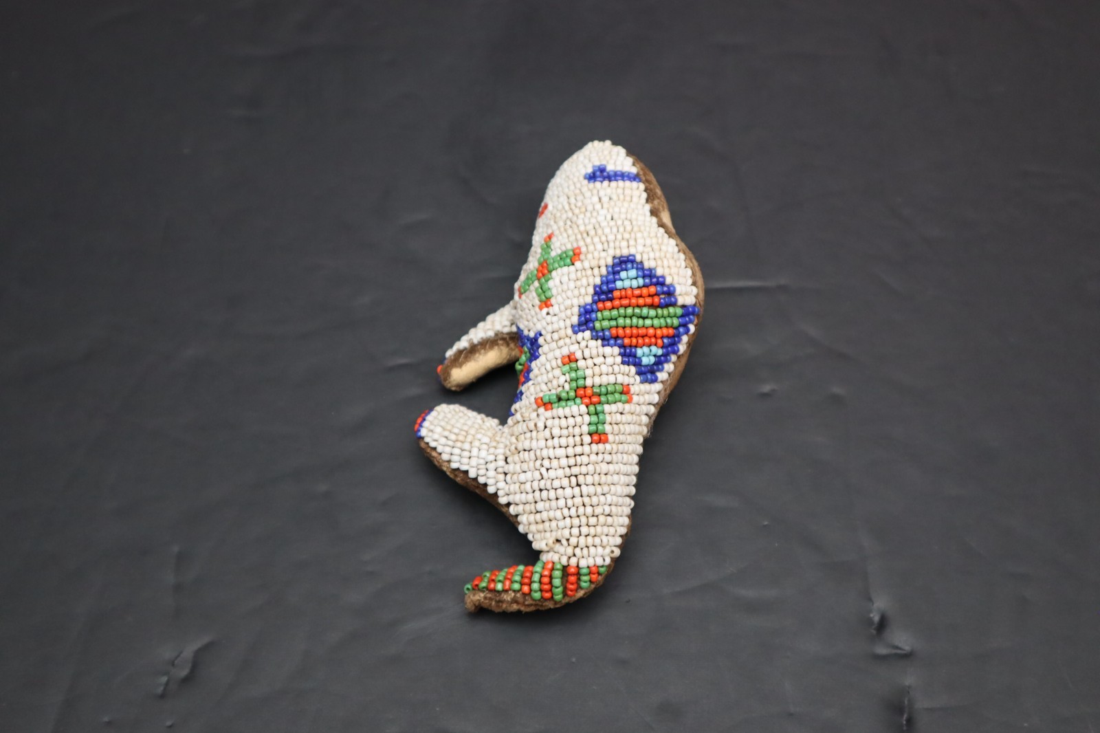 HAND MADE NATIVE AMERICAN BEADED LEATHER FETISH, BUFFALO AMULET