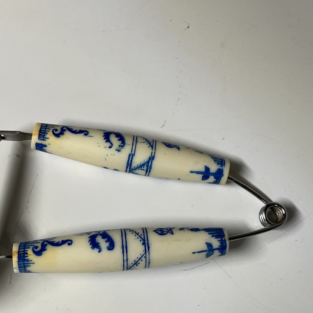 Bakelite White Blue Floral Spring Action Meat Serving Fork Slider