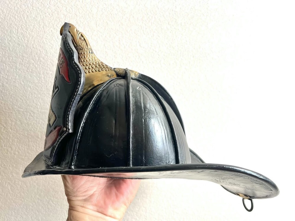 Antique Cairns leather firefighters helmet.