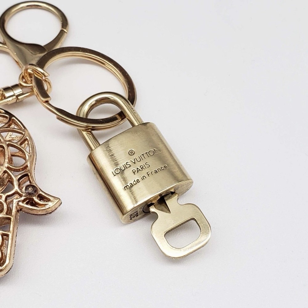 Authentic Louis Vuitton Lock & Key w/ Unbranded Bagcharm, Keychain