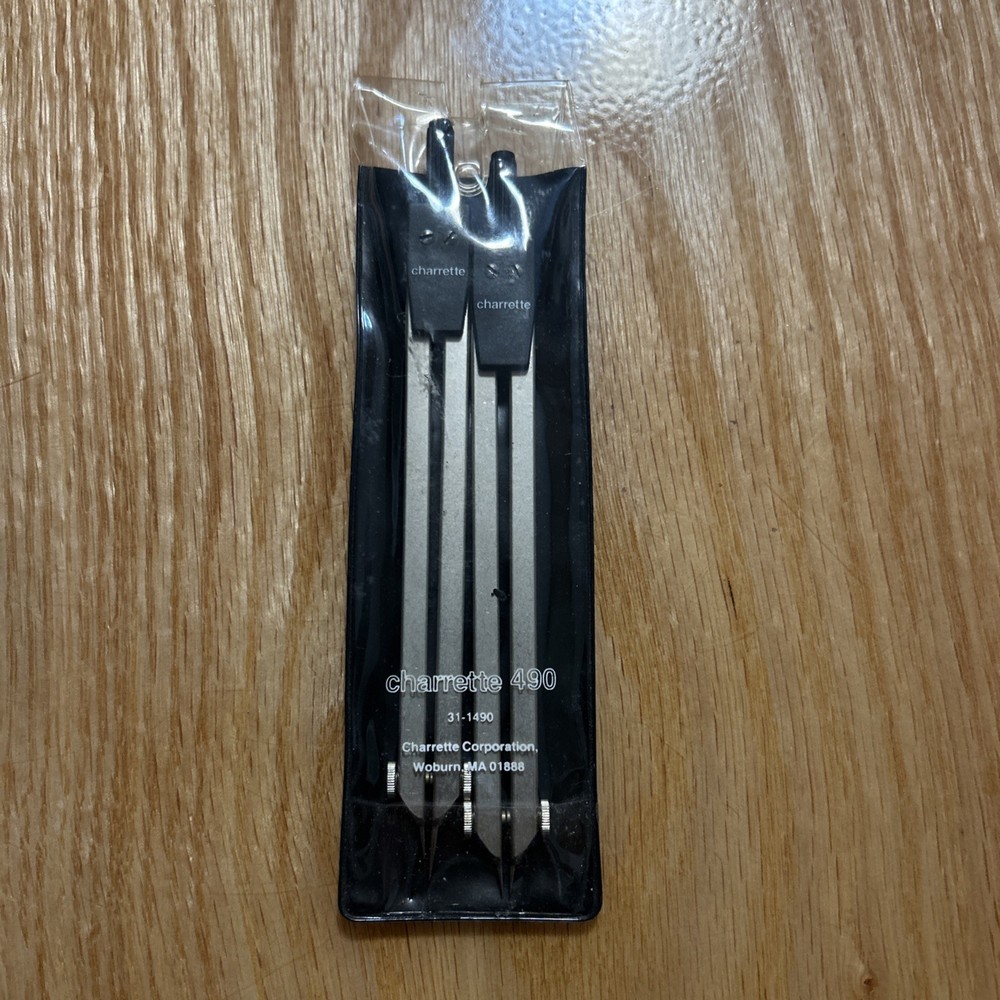 Lot of four drafting compasses