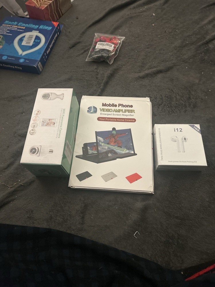 Electronics Bundle Lot – Phone Amplifier, Wireless Earbuds, WiFi Camera