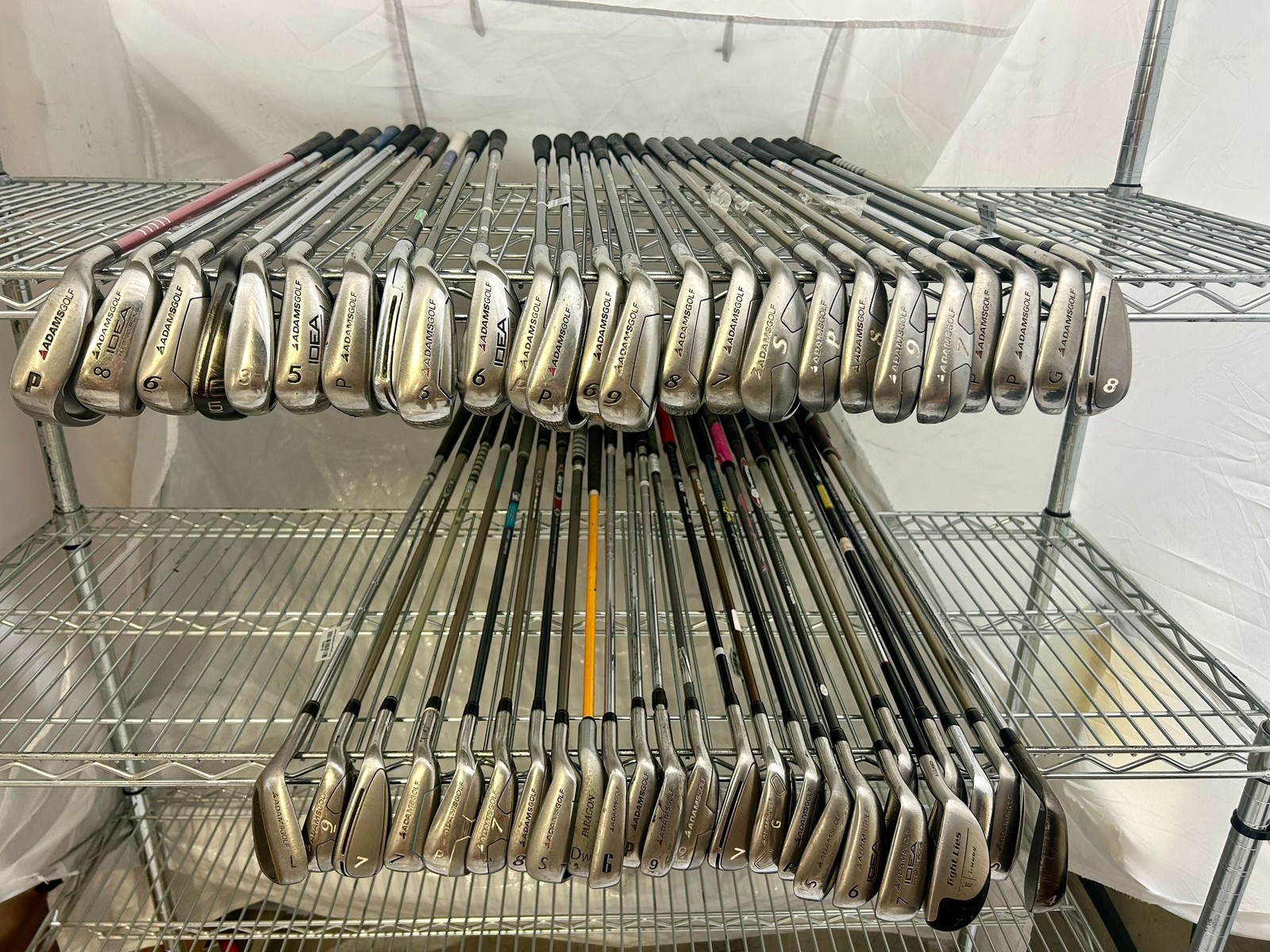 Wholesale Lot of 50 Golf Clubs - Right and Left-Handed Adams Assorted Irons