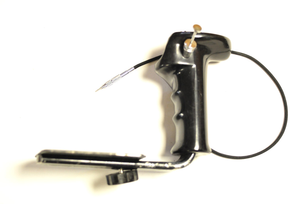 Suntar medium format flash / accessory / grip bracket with a cable release.