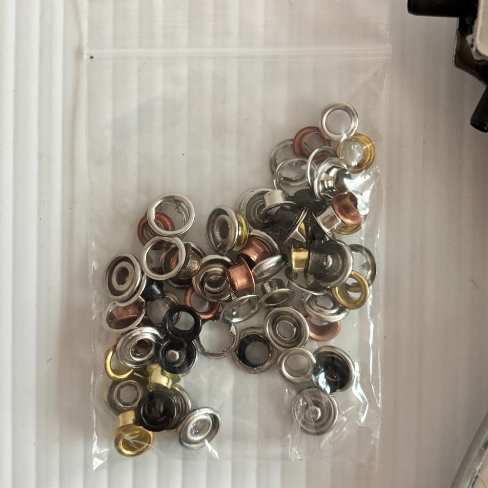 Revolving Punch Tool with Brads