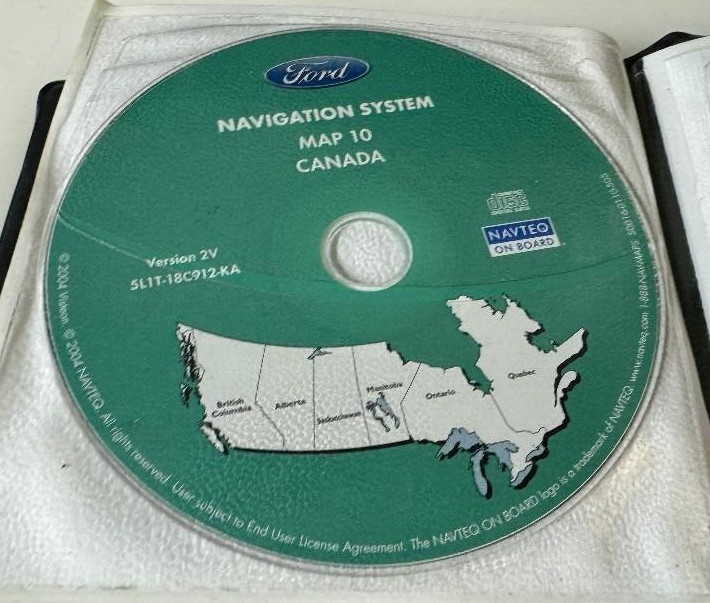 FORD P/N 5L1T-18C912-AA NAVIGATION SYSTEM DISCS ((MISSING 8)) UNTESTED CONDITION