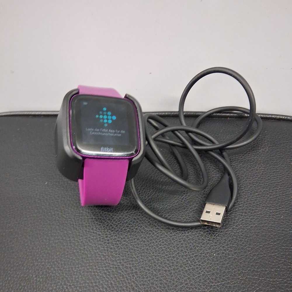 Fitbit Light FB415 Purple W/ Charging Cable good condition